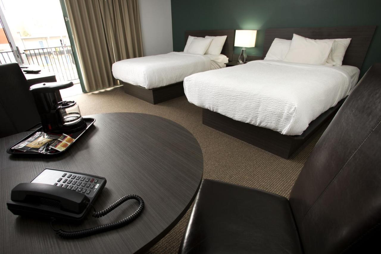 Motel Room with Two Double Beds - Exterior Entrance,717462265:JPEG